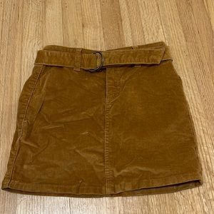 Brand is Celebrity Pink bought bring Tilly’s, size is kids 10, color is brown.